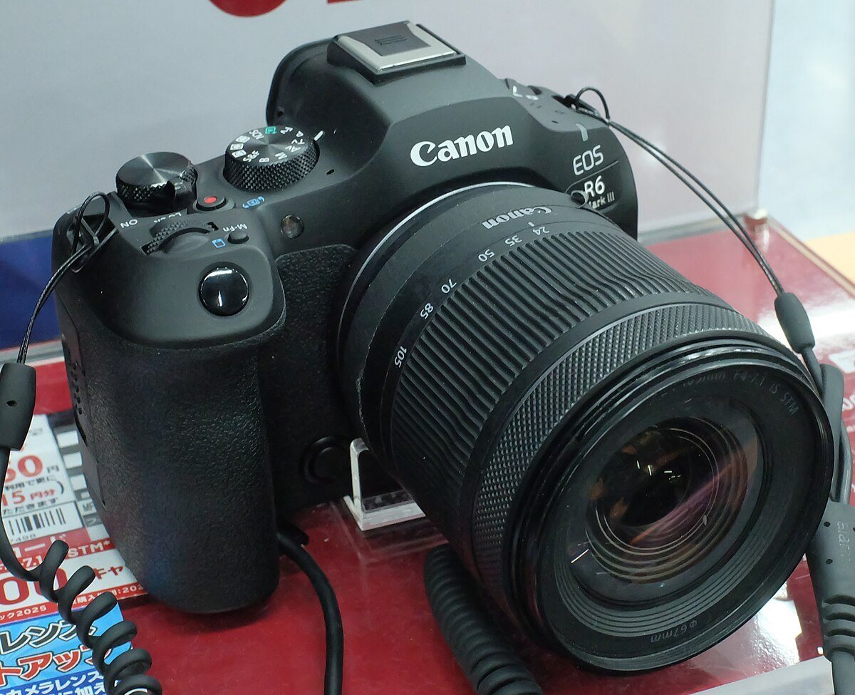 The R6 V story is also a lens story: Canon is building controls around video movement and repeatable solo operation.
